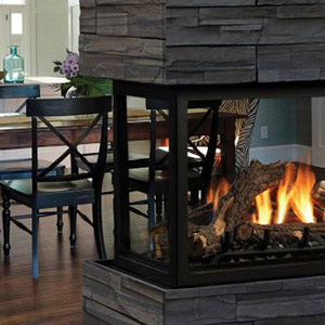 Stacked Stone Fireplace Surround With Zero Clearance Wood Burning Fireplace And Dining Set